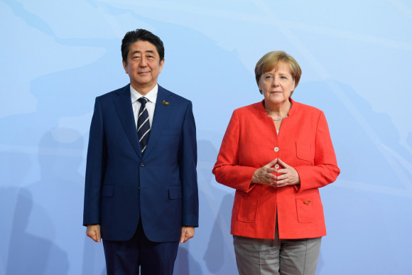 Federal Chancellor Angela Merkel welcomes Japan's Prime Minister, Shinzō Abe, at the start of the G20 Summit in Hamburg. 