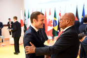 Emmanuel Macron, President of France, talks with South Africa’s President Jacob Zuma before the start of a retreat on counter-terrorism.Zuma