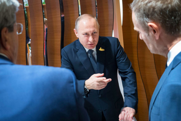 Vladimir Putin, President of Russia, speaks with Italian Prime Minister Paolo Gentiloni and European Council President Donald Tusk.