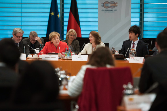 Chancellor Angela Merkel (at left) and Federal Minister for Family Affairs Katarina Barley (SPD) take part in the Y20 (Youth 20) summit 2017 at the Federal Chancellery, with young people from G20 states.